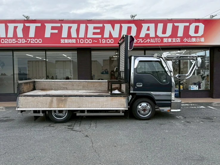 車両画像 13: 平成13年(2001)：いすゞ：エルフ：平ボデー